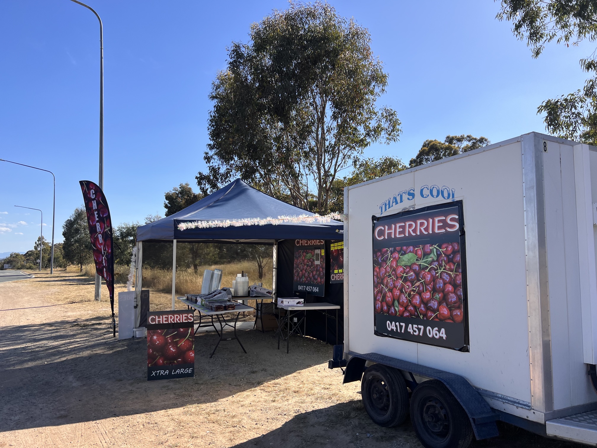 Cerina Cherries roadside marquee and refrigerated trailer set up for market day